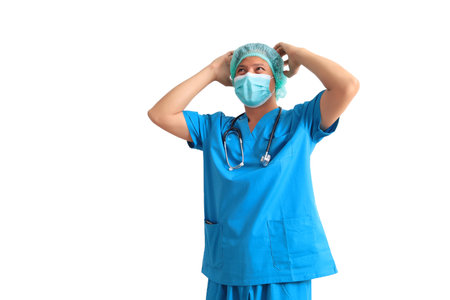 Portrait of a female surgeon isolated on white background. Medical concept.の写真素材