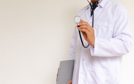 Doctor in lab coat on white backgroundの写真素材