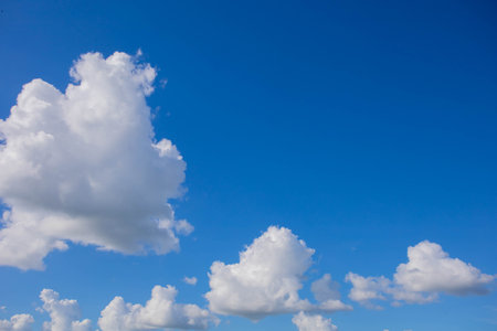 white clouds in the skyの写真素材