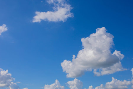 white clouds in the skyの写真素材