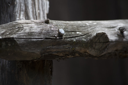 Close-up of joint of wooden fence postの写真素材