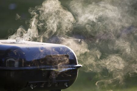 Smoke from closed grill の写真素材