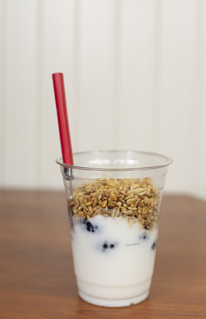 Close up of a blackberry parfait in a clear serving cupの写真素材