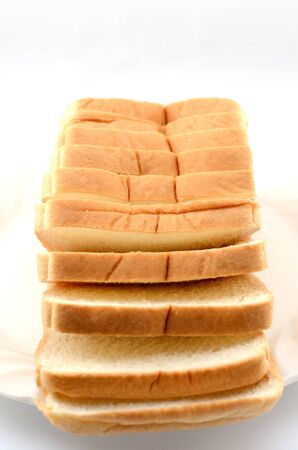 Sliced bread on the plateの写真素材