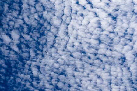 Altocumulus clouds in the blue sky