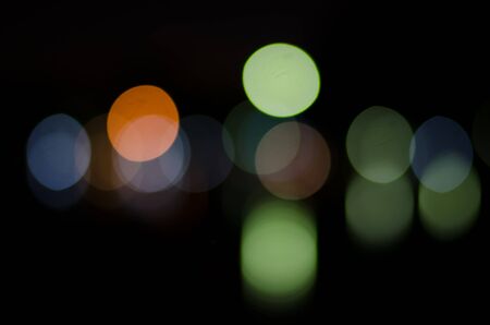 Defocussed night light background. Abstract circular bokeh.の写真素材