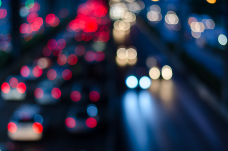 Blurry night light traffic in Bangkok city, Thailand. Abstract defocused background.