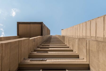 Urban Geometry, looking up to glass building. Modern architecture, glass and steel. Abstract architectural design. Inspirational, artistic image. Industrial design. Modern building.の写真素材