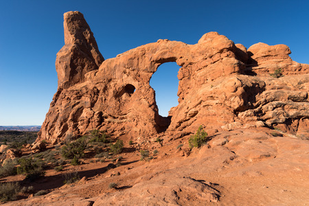 Turret Arch with one of the many trails that lead to these monuments within Arches National Park.の写真素材