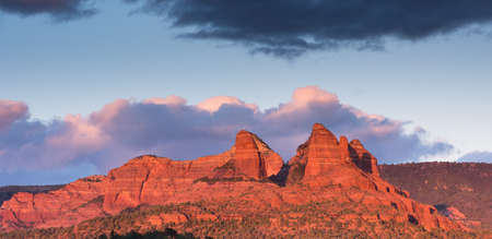 Thumb Butte and Red Rock Country in the late evening light above Sedona Arizona.の写真素材