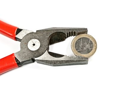 Euro coin and tongの写真素材