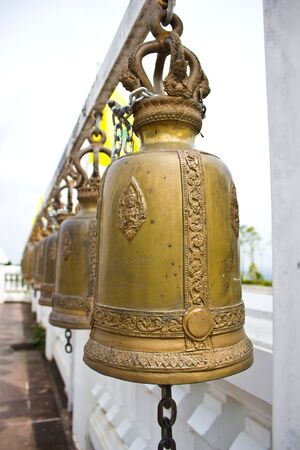 Bells in a buddhist temple of Thailandの写真素材