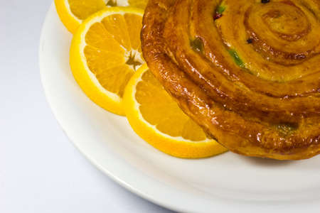 Breakfast  bread and orange slicesの写真素材