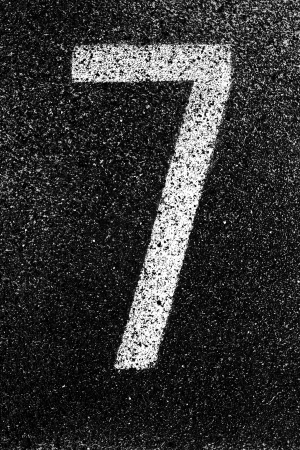 Number seven color white and black on running trackの写真素材