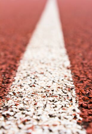 Close up curve running track rubber standard red color