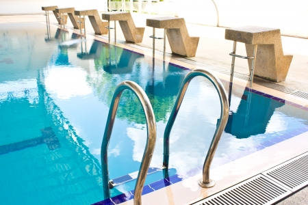 Stairs of the empty swimming pool in universityの写真素材