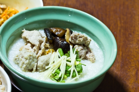 Traditional chinese porridge rice gruel in bowlの写真素材