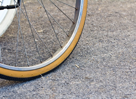 Bicycle wheel on the road
