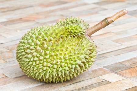 Close up durian fruit on the wood board