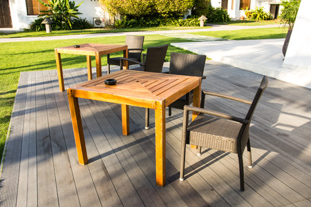 Empty tables and chairs in a outdoor cafe