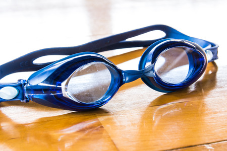 goggles for swimming on the floorの写真素材