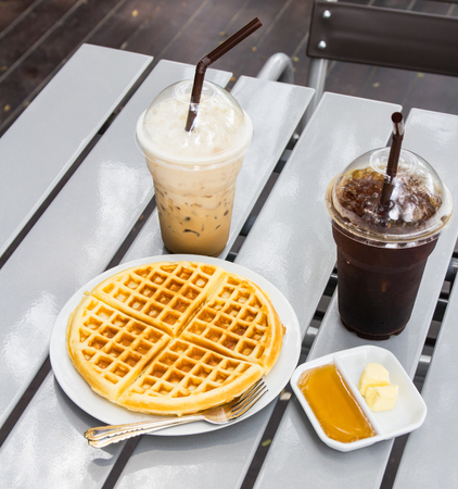 fresh waffle  in white plate on the tableの写真素材