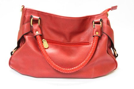 Red women bag isolated on white backgroundの写真素材