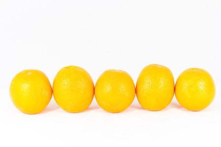 orange fruits on white backgroundの写真素材