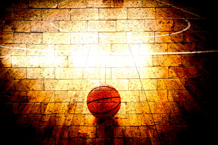 basketball court with red brick wall texture backgroundの写真素材