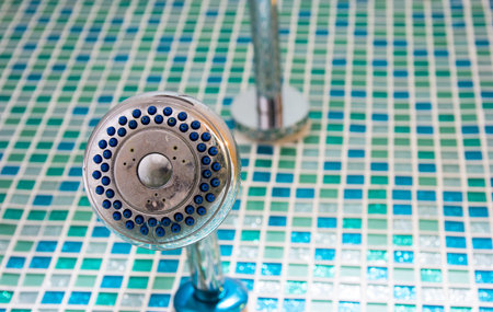 Close up on old head showerの写真素材