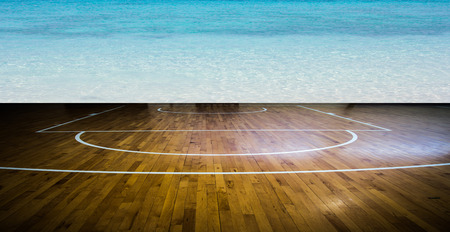 Basketball court with clean water seaの写真素材