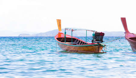 long tail boat on the seaの写真素材