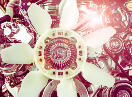 Close up part of car engine with filter lens flare effect vintage style
