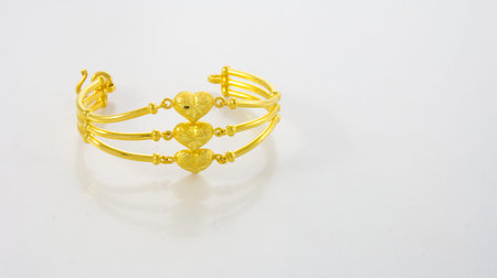 Gold Bracelet Over White Backgroundの写真素材