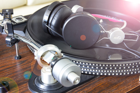 old fashioned turntable  with effect filter lens flareの写真素材