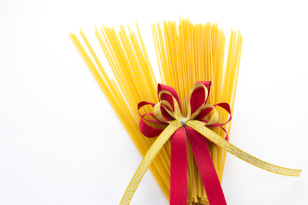 dry pasta isolated on a whiteの写真素材