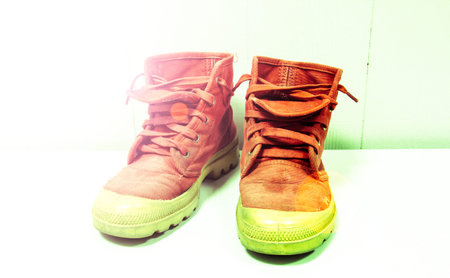 red shoes on a wooden floor