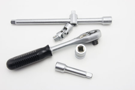 close up car engine with tools