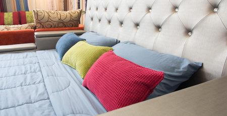 close up red pillow on the bedroom