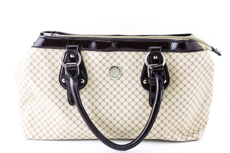 Elegant woman bag on white