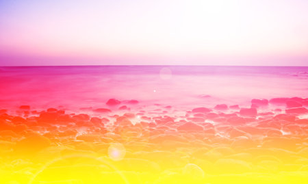 Beautiful long exposure of sunrise over the seaの写真素材