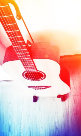 Close up wooden acoustic guitarの写真素材