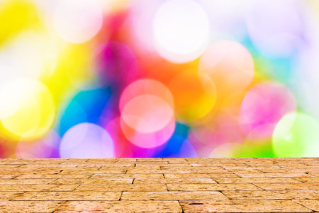 Defocused abstract bokeh background with brick wall