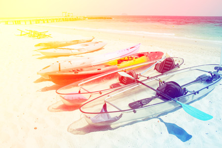 kayaks on the tropical beach with color filtersの写真素材