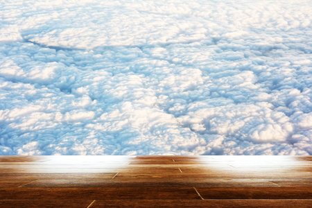 blue sky with cloud closeup as background with wooden