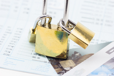 security concept padlock with book bankの写真素材