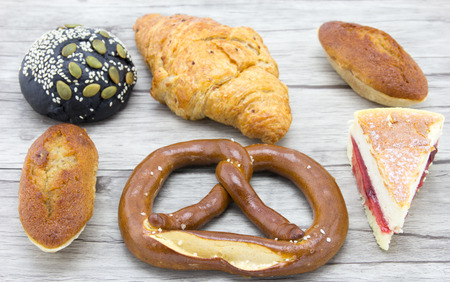 Tasty bread on wooden backgroundの写真素材