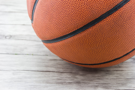 Basketball ball on wood backgroundの写真素材