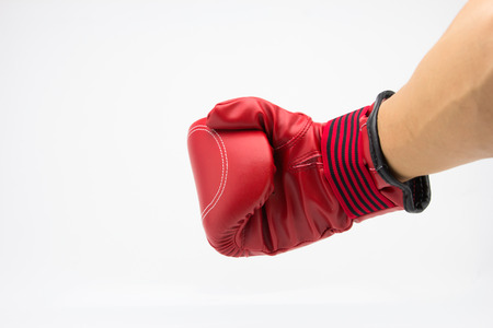red boxing glove on white backgroundの写真素材