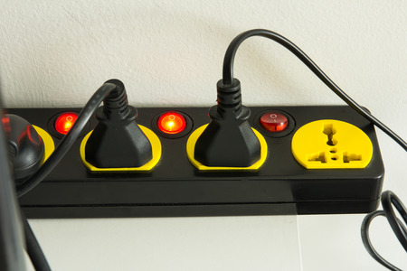 Electric plug.Multiple socket with connected plugs.の写真素材